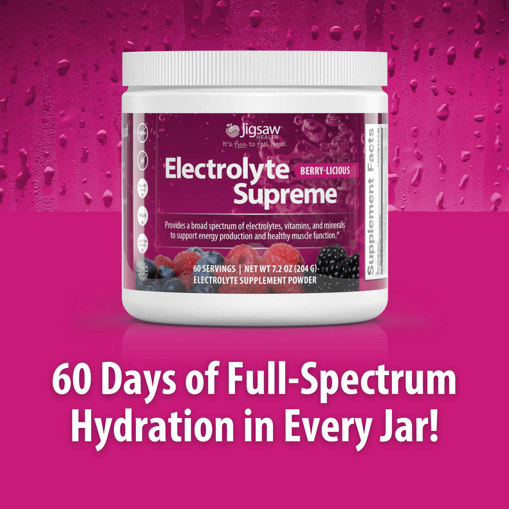 Jigsaw Electrolyte Supreme Berry-Licious scoop beside jar