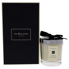 Jo Malone Lime Basil & Mandarin candle closeup glow for cozy evenings