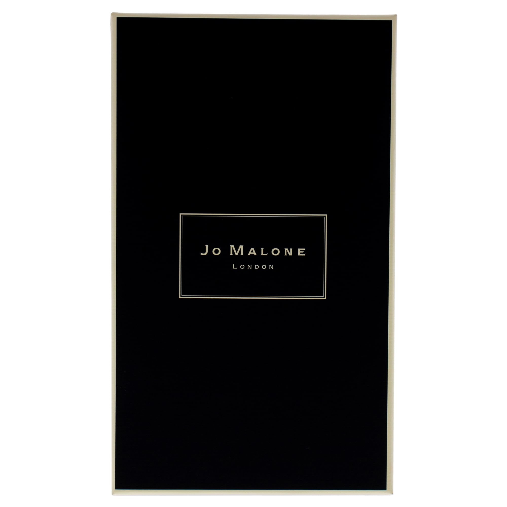 Jo Malone Lime Basil & Mandarin candle in a living room setting