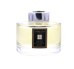 Jo Malone London diffuser bottle close-up showcases elegant design for stylish room fragrance.
