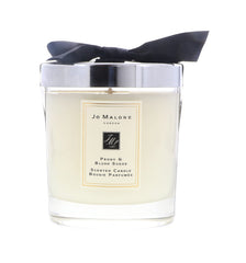 Jo Malone Peony & Blush Suede candle in glass creates refined ambience with floral warmth.