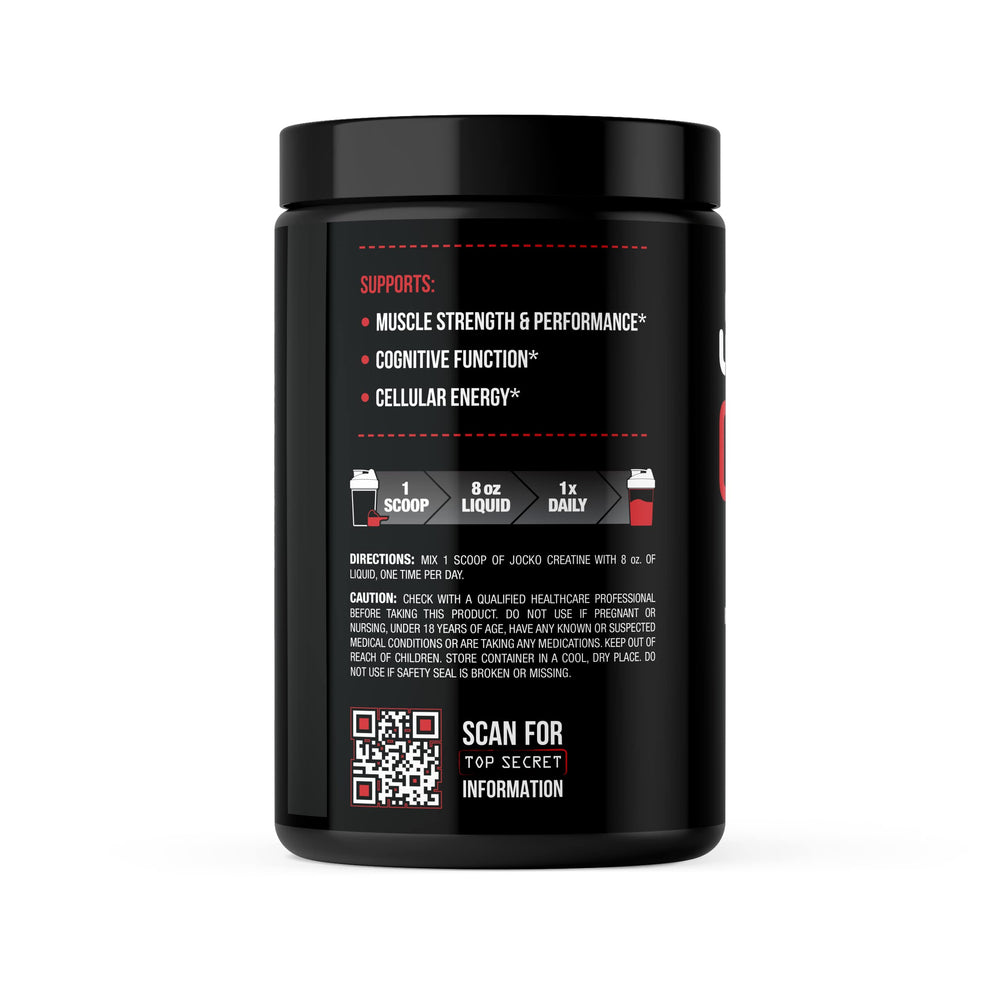 Pouring Jocko Fuel Creatine Monohydrate into a glass for blending.