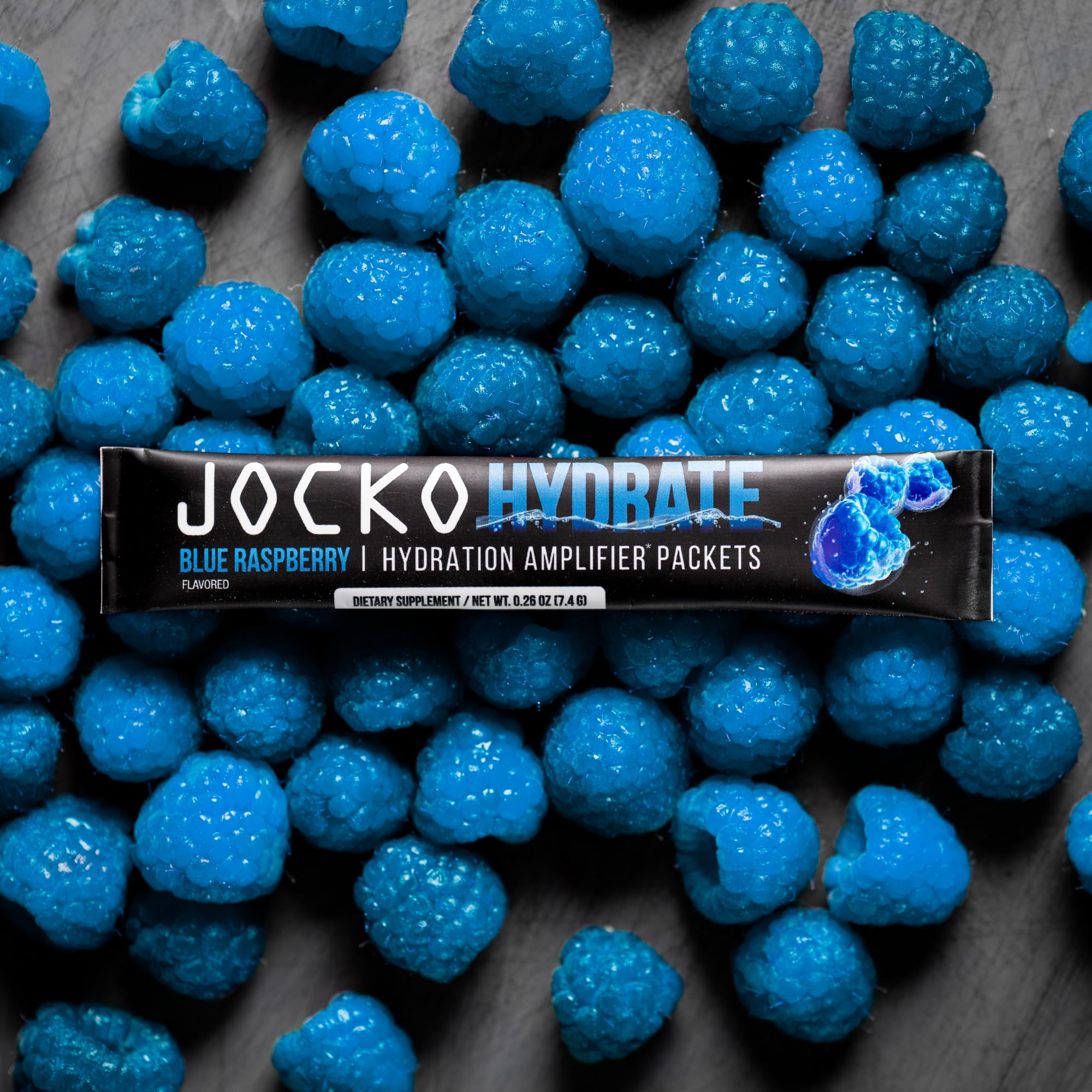 Jocko Fuel Hydrate packet being stirred after a workout