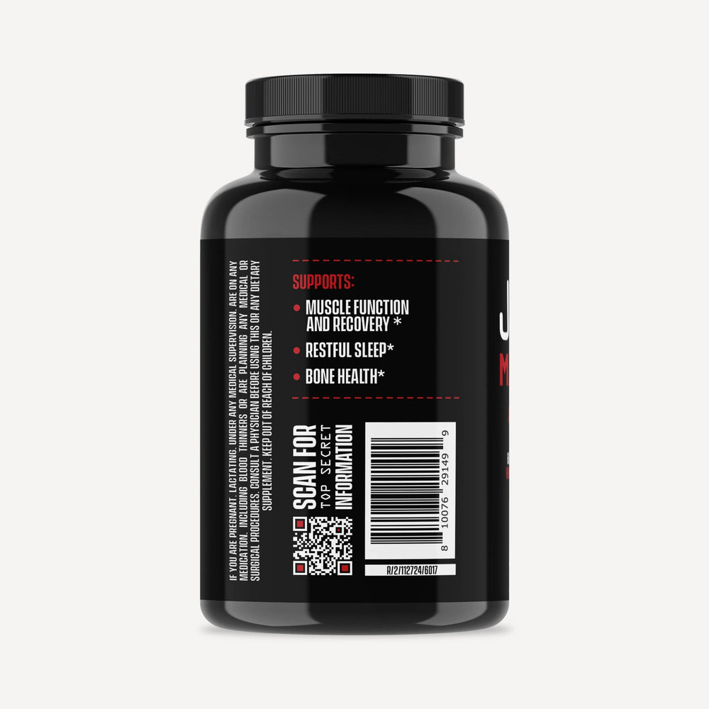 Jocko Fuel Magnesium Complex bottle in use during post-workout cooldown.