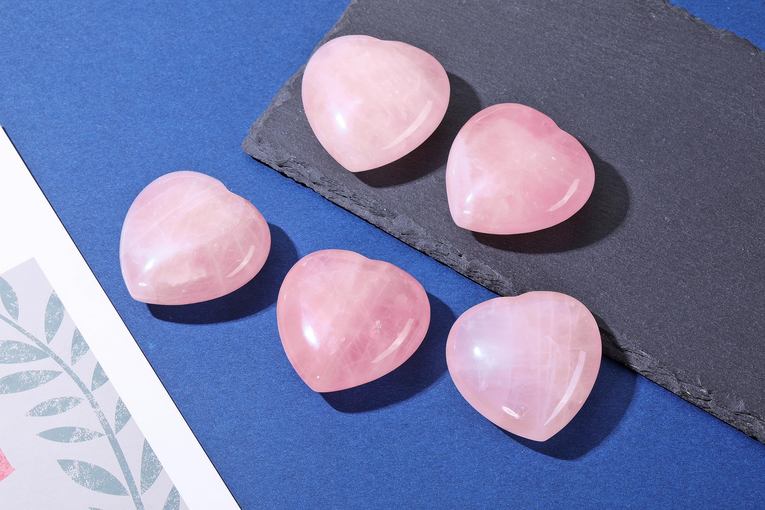 Jovivi meditation rose quartz heart — compact palm stone for centering.