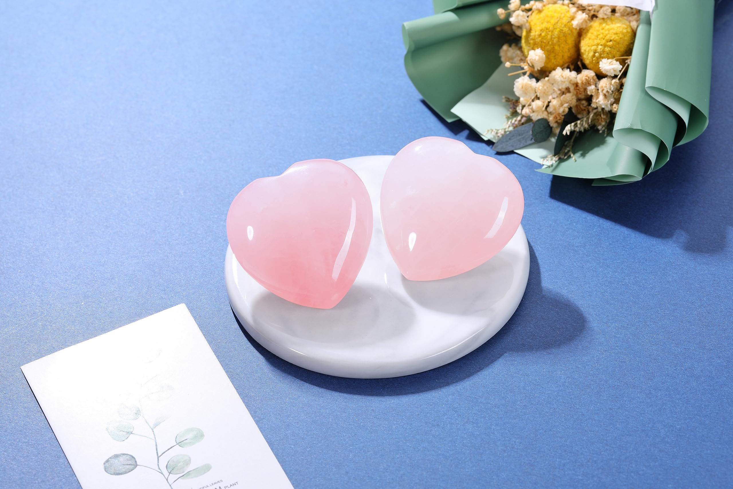 Jovivi rose quartz energy crystal — soothing palm stone for relaxation.
