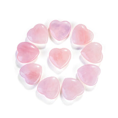 Close-up of Jovivi rose quartz heart crystal showing natural marbling.