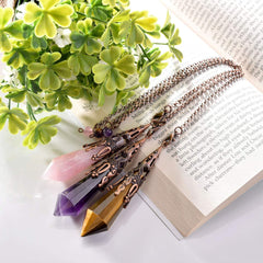 Jovivi rose quartz pendulum inviting calm energy during meditation