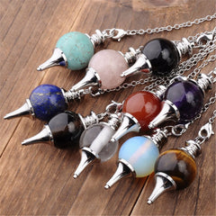 Jovivi rose quartz pendulum image emphasizing gentle energy and chakra balance ideas.