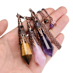 Jovivi tiger eye pendulum aiding clarity in energy work