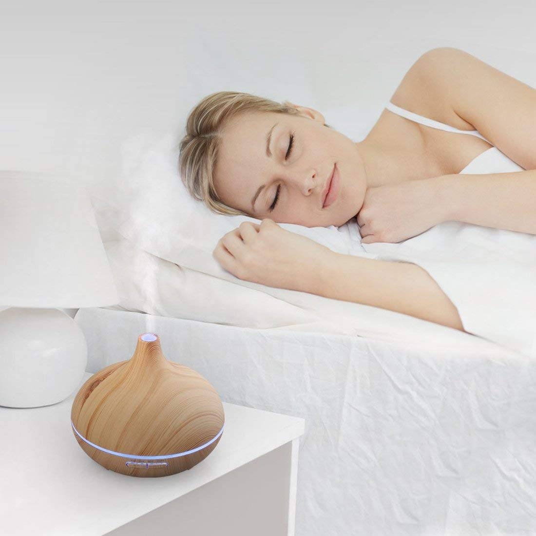 JoySusie diffuser remote control enables easy timer adjustments from across the room.