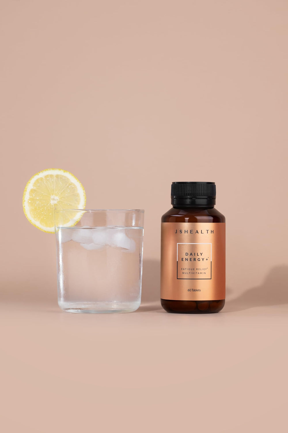 JSHealth Daily Energy packaging highlights vegan, non-GMO formula.