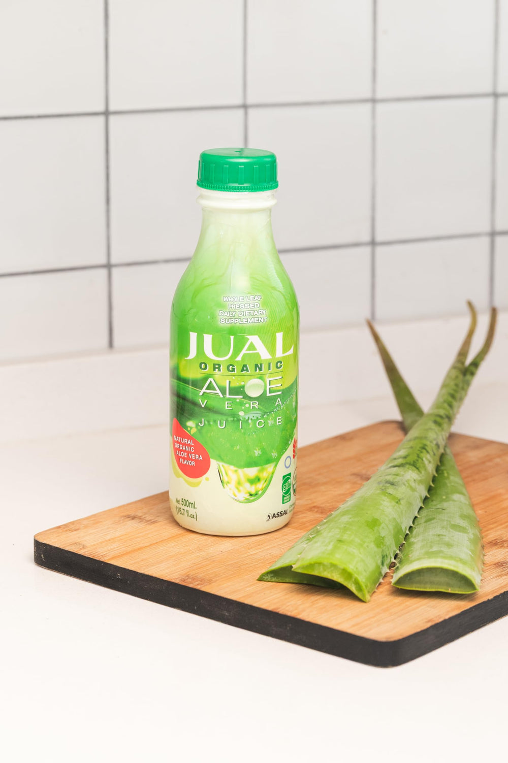 JUAL Aloe Vera Juice bottle front shows organic label and zero sugar.