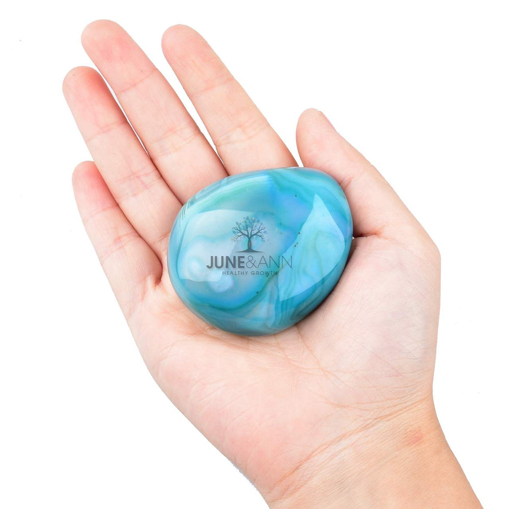 June&Ann Green Agate palm stone in hand, for chakra balancing rituals.