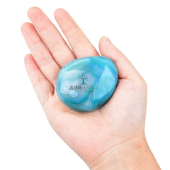 June&Ann Green Agate palm stone in hand, for chakra balancing rituals.