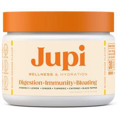 Jupi Hydration & Wellness shot in glass shows turmeric-ginger blend for immune-support