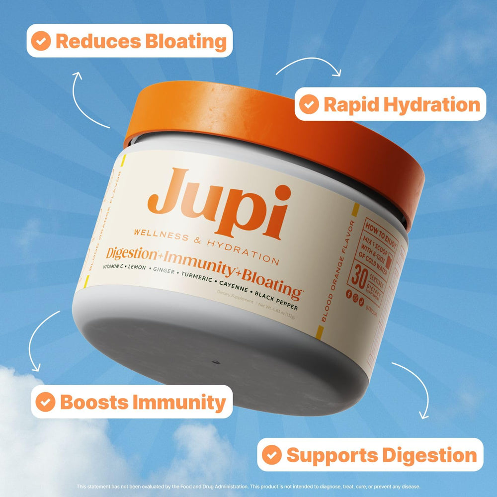 Jupi turmeric-ginger-shot powder scoop demonstrating easy daily hydration