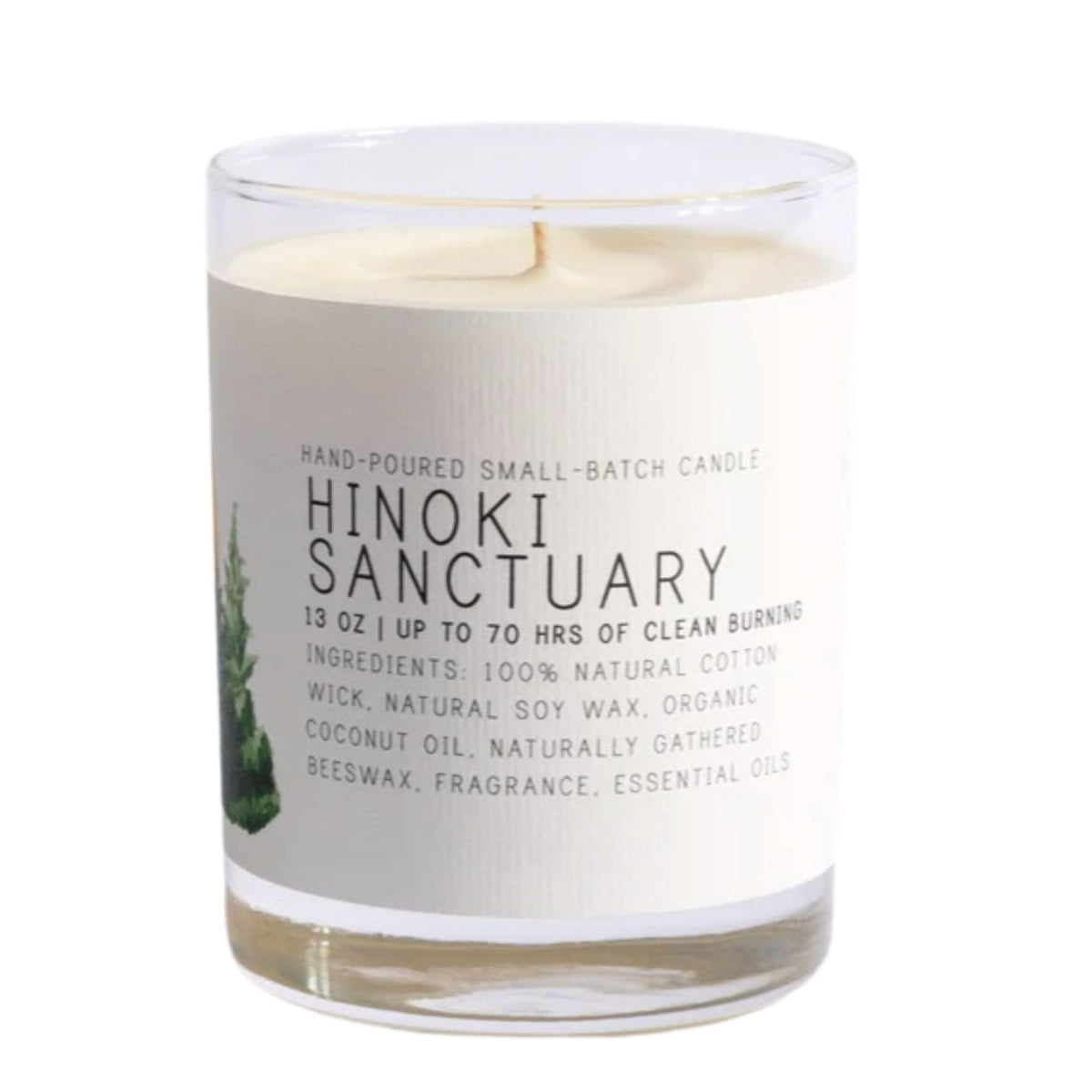 Just Bee Hinoki candle in glass holder emits a calming aroma for cozy evenings.