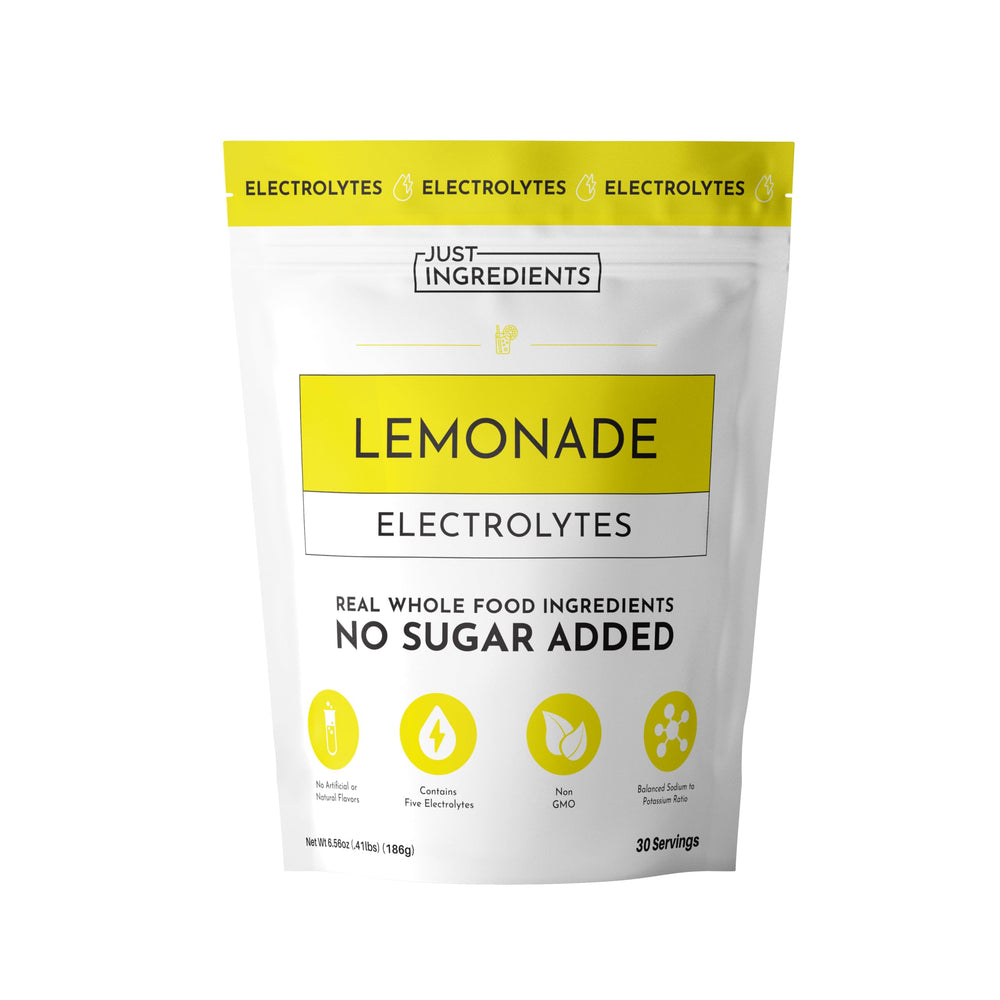 JUST INGREDIENTS Lemonade Electrolytes bottle pouring for quick post-workout hydration