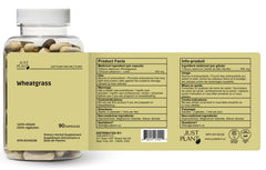 Just Plant Organic Wheatgrass Capsules close-up highlighting vegan, gluten-free wellness and digestion aid.