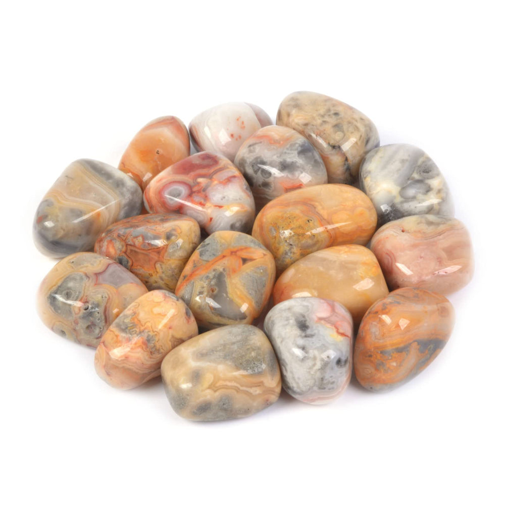 Justinstones Crazy Lace Agate stones in a colorful pile for display.