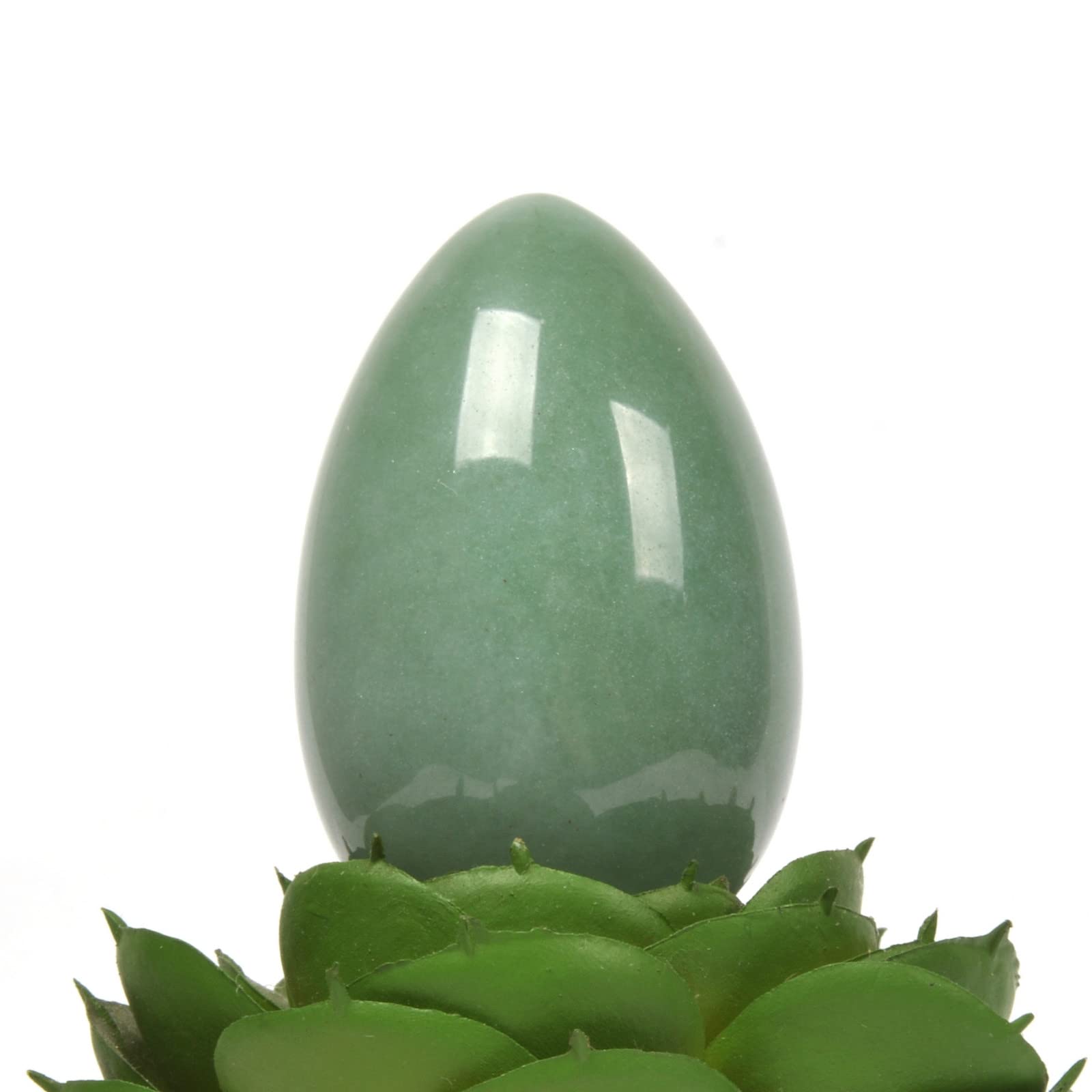 Justinstones green aventurine egg on stand displayed elegantly.