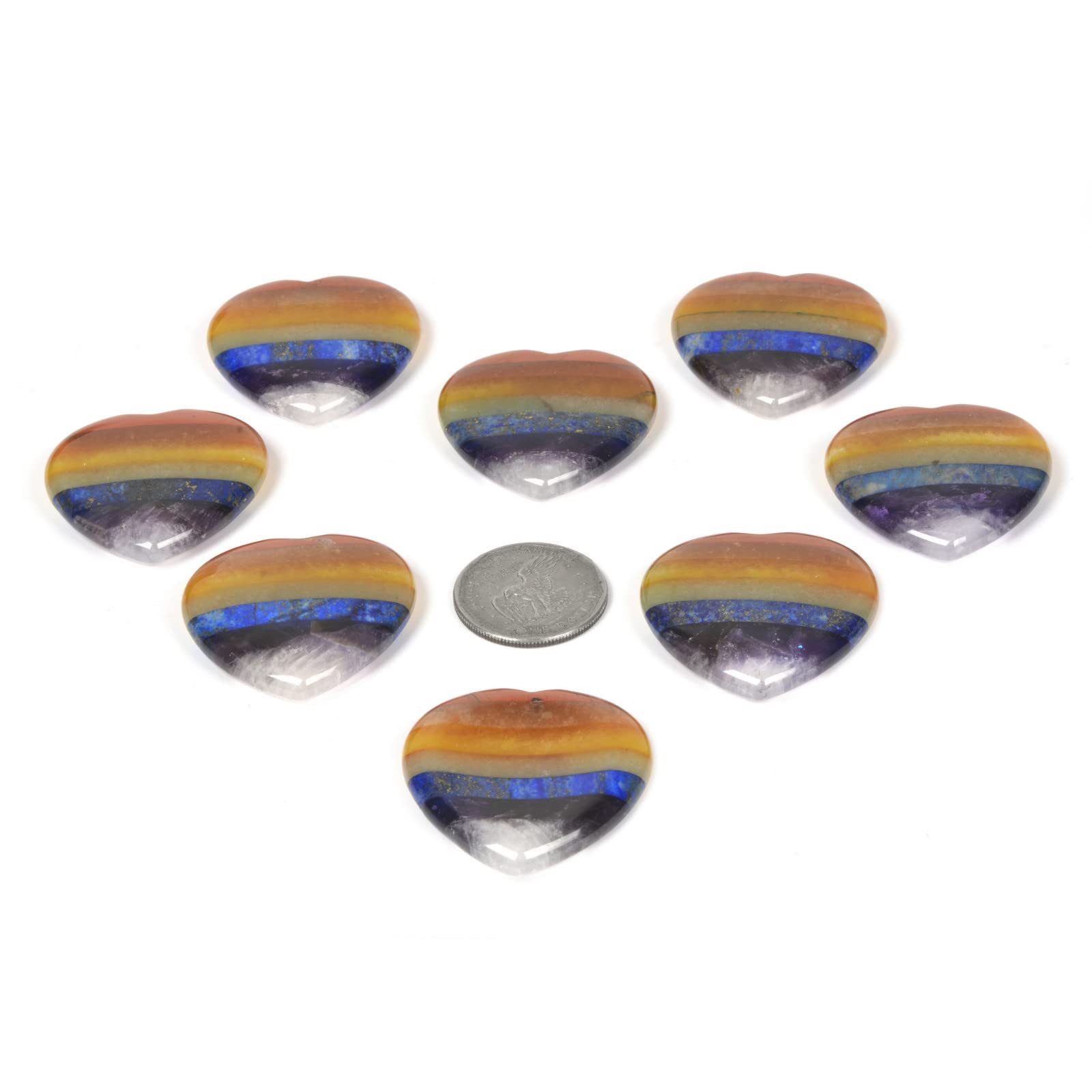 Justinstones hand-holding thumb stone demonstrates portable focus aid for mindfulness.