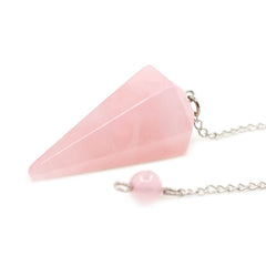 Justinstones rose quartz pendulum with 12-face cut promotes intuitive readings during sessions.