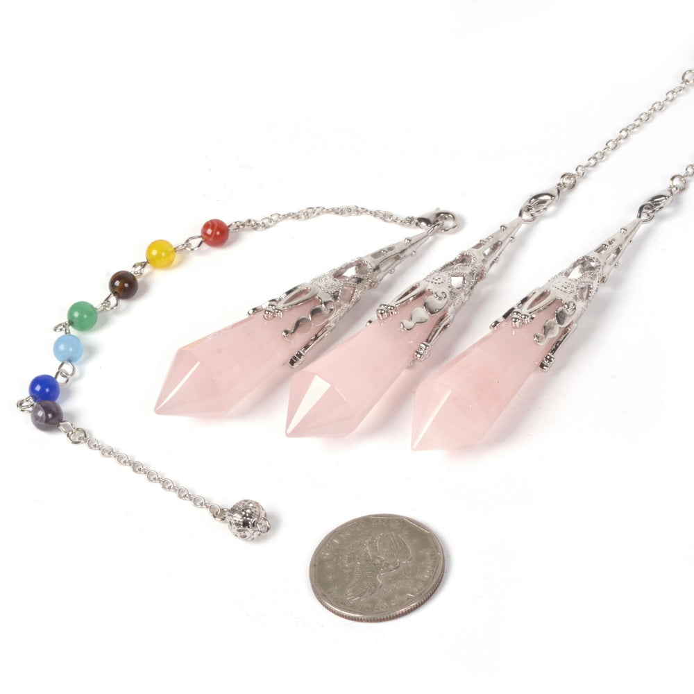 Justinstones rose quartz pendulum in action for energy flow and divination practice