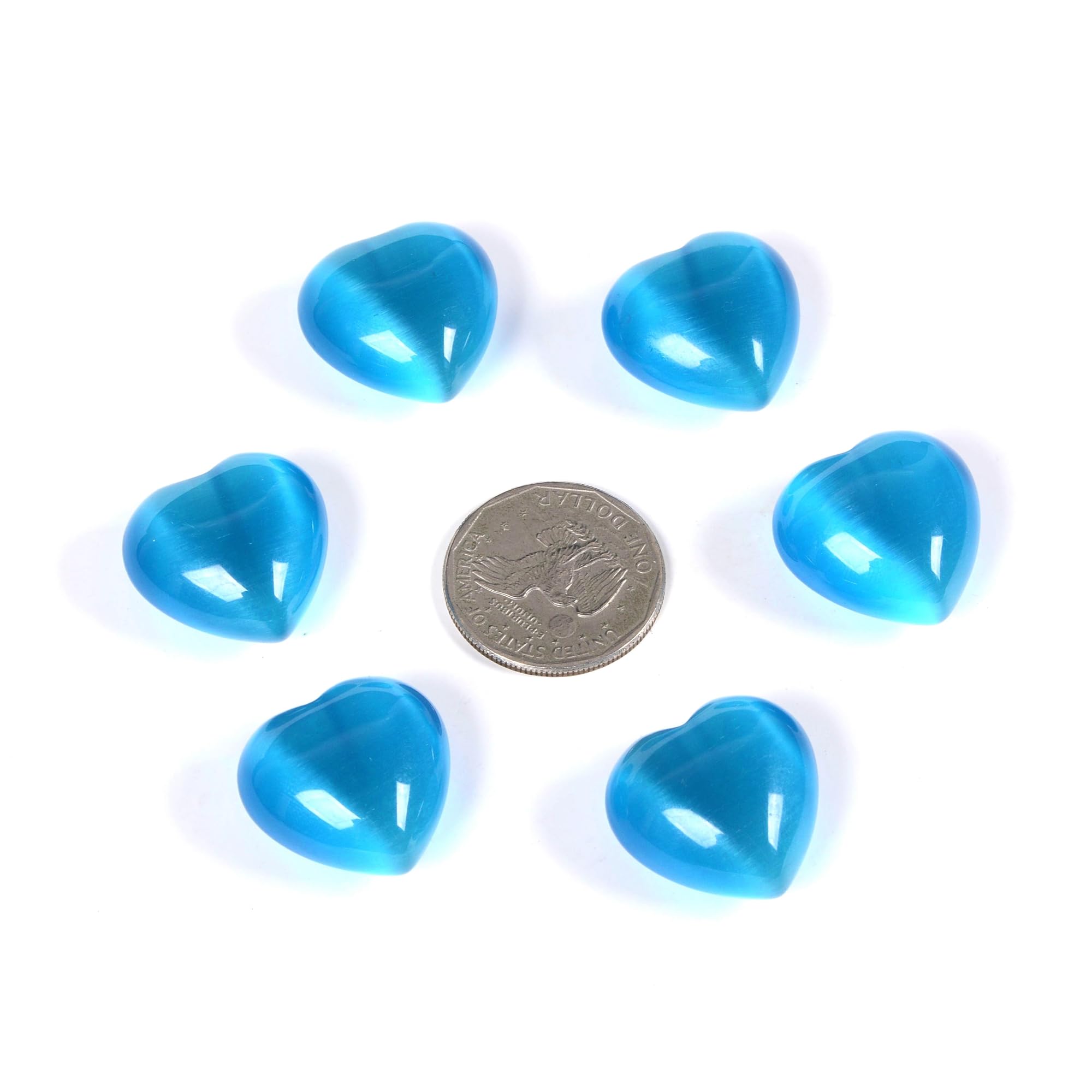 Justinstones sky blue cat's eye heart crystal reflecting light during meditation