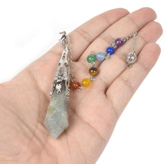 Justinstones labradorite pendulum showcases unique color variations for ritual ambiance.