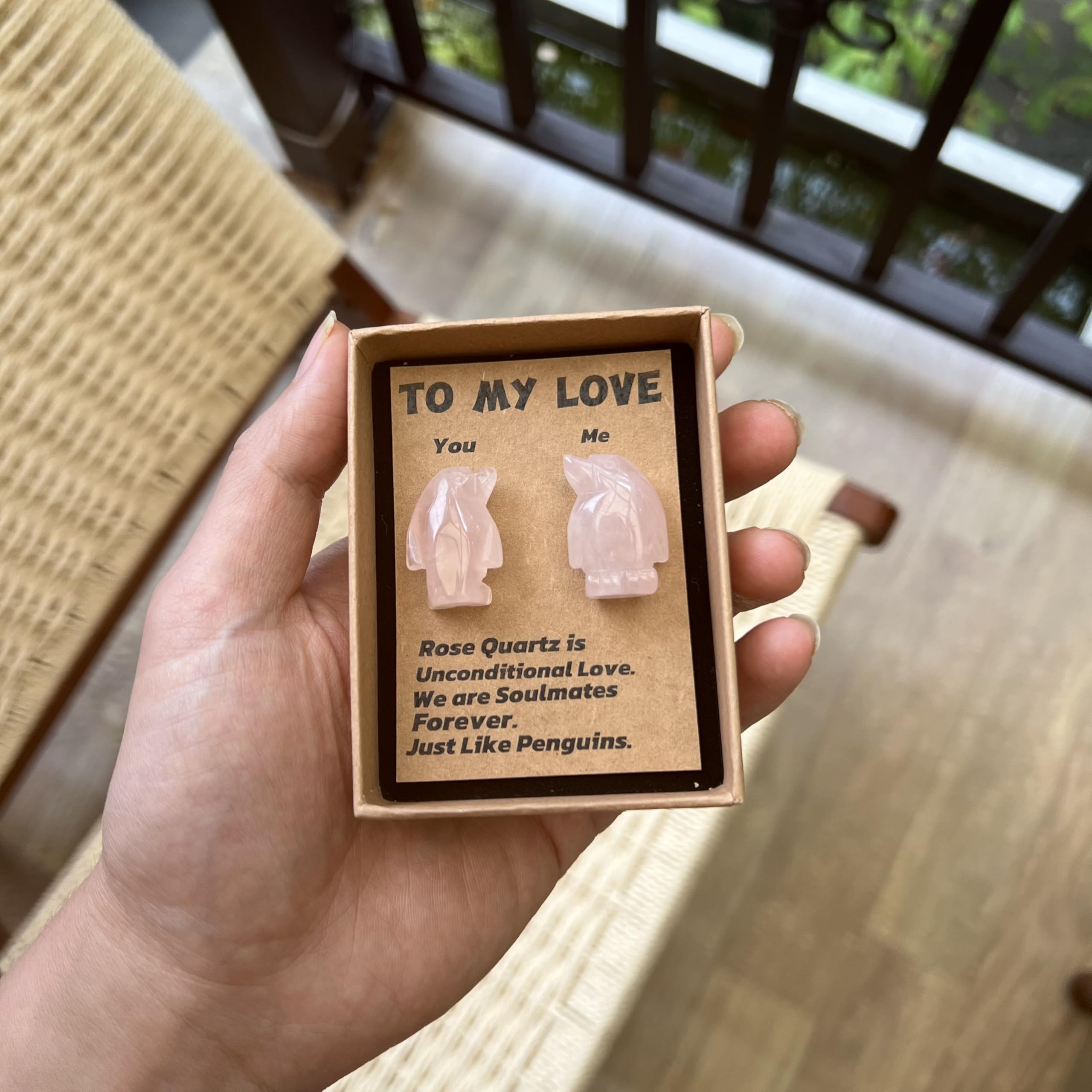 Jvuessieye Penguin couple statue symbolizes harmony for anniversaries.