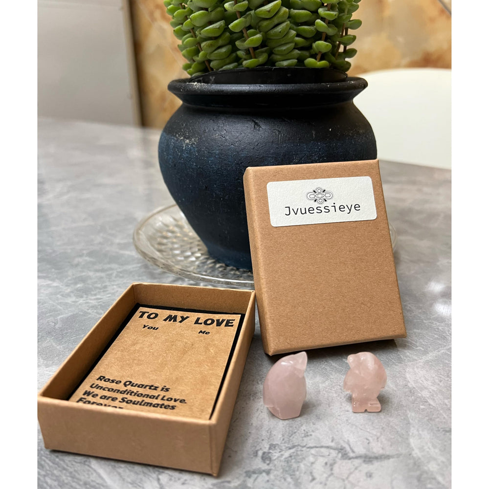 Jvuessieye Rose Quartz penguin figurine as engagement or anniversary gift.