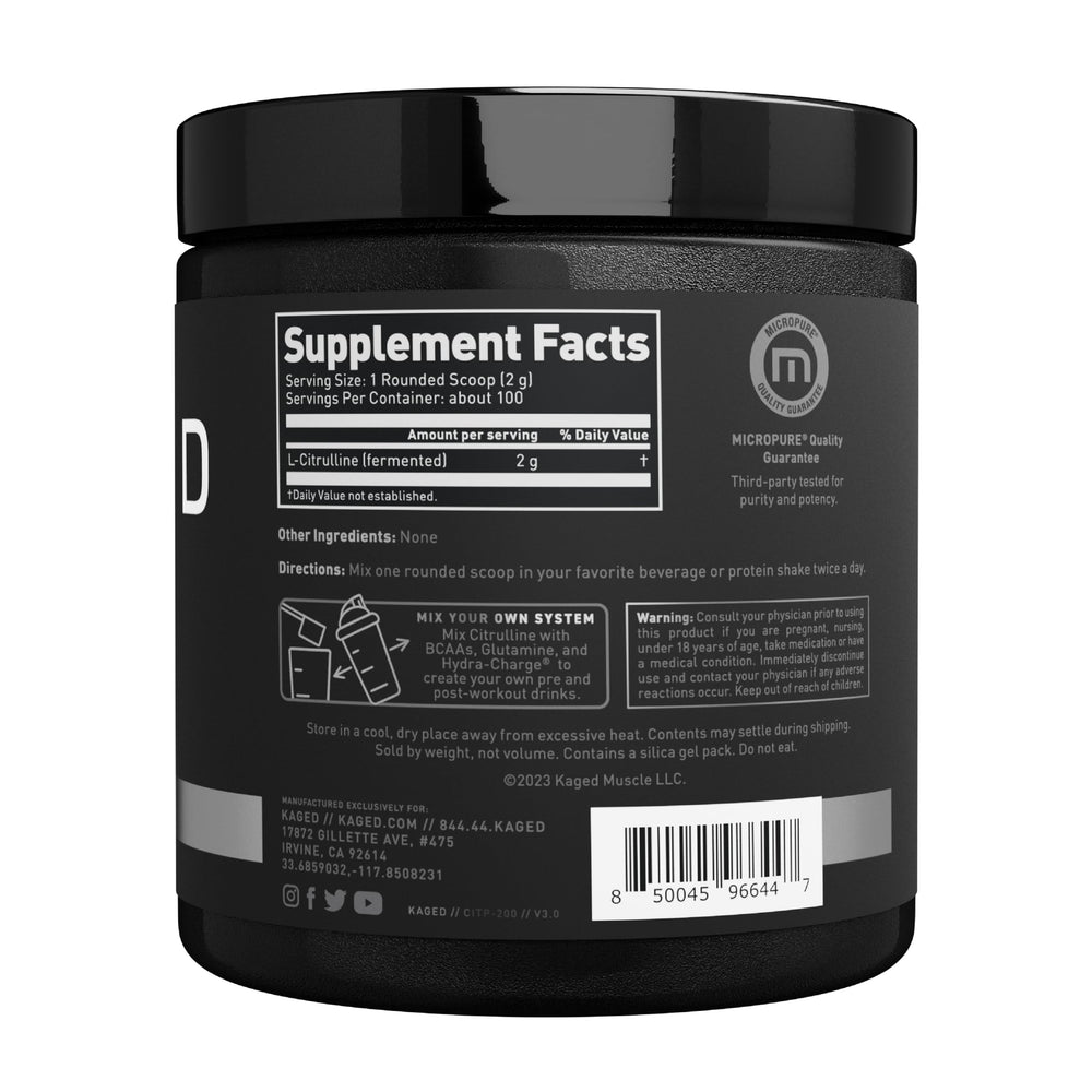 Bottle beside glass ready for pre-workout use with Kaged L-Citrulline.