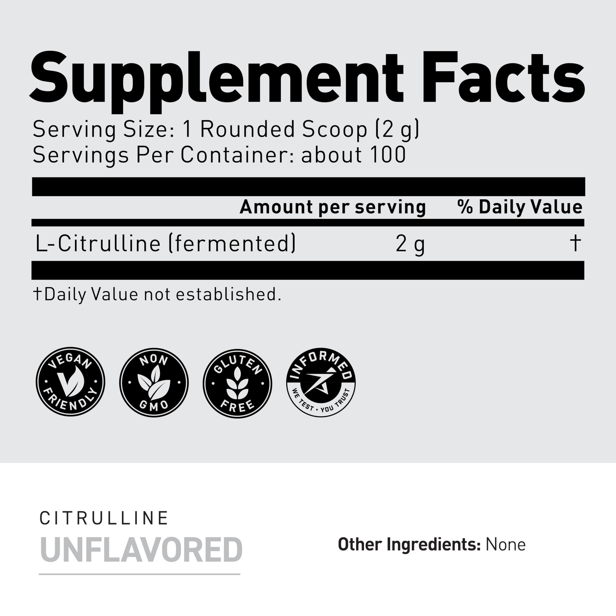 Measuring scoop with Kaged L-Citrulline powder ready for pre-workout dose.