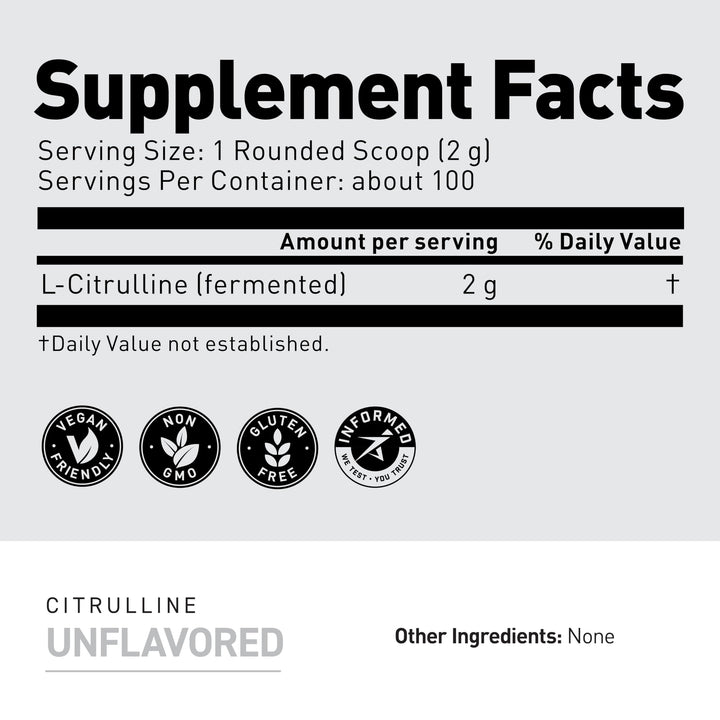 Measuring scoop with Kaged L-Citrulline powder ready for pre-workout dose.