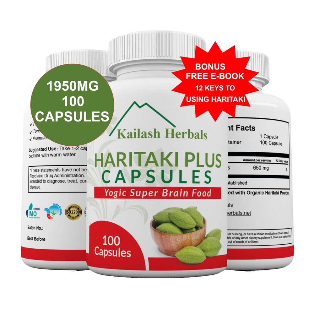 Kailash Herbals Haritaki capsules on tray implies gentle cleansing routine.