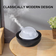 Kakoda diffuser features a hand-blown glass cover for a stylish centerpiece.