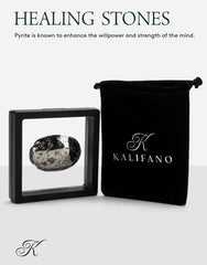 KALIFANO pyrite palm stone with warm glow for focus and manifestation rituals.