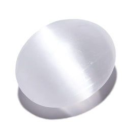Kalifano selenite palm stone close-up highlighting its smooth surface and calming energy