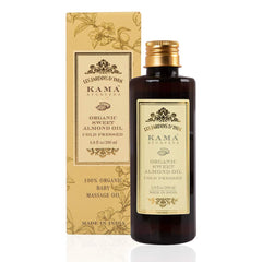 Close-up of Kama Ayurveda Sweet Almond Oil dropper bottle ready for use.