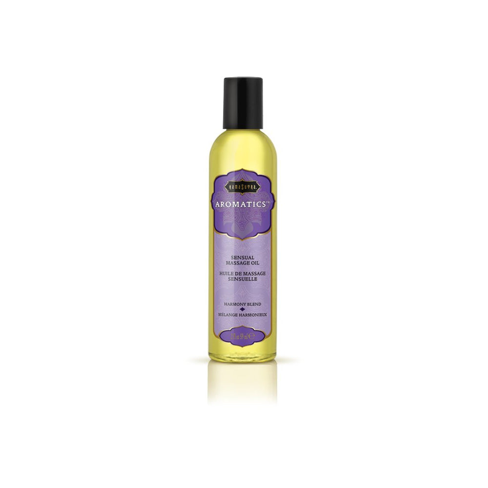KAMA SUTRA Harmony Blend bottle pouring for a soothing full-body massage.