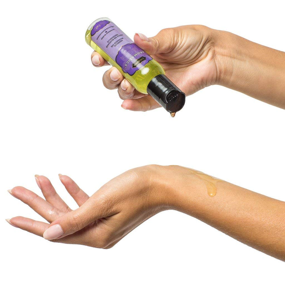 KAMA SUTRA Harmony Blend used in a couple massage for daily skin hydration.