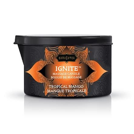 Kama Sutra Ignite relaxing scene with warm candle glow and massage oil