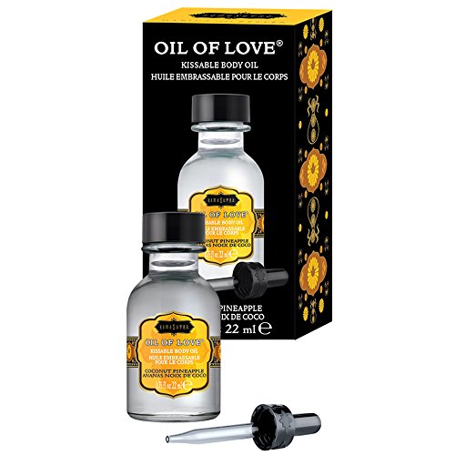 KAMA SUTRA Oil of Love dropper applying warmth to skin for foreplay