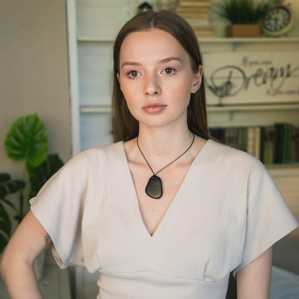 Karelian Heritage shungite necklace on cord for versatile daily wear.