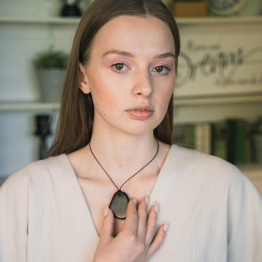 Karelian Heritage shungite pendant back detail reveals craftsmanship.