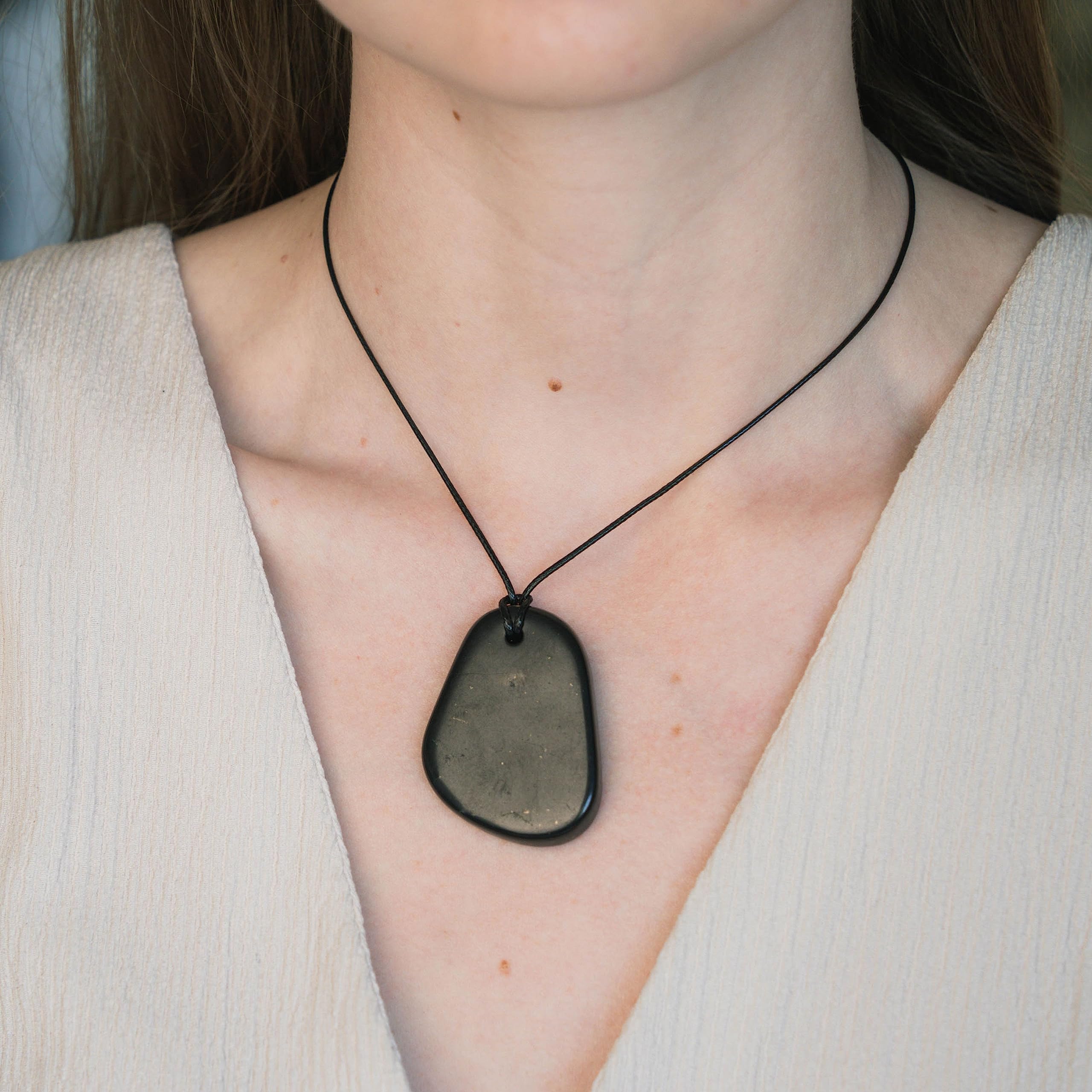 Karelian Heritage shungite pendant detailed cut showcases minimalist design.