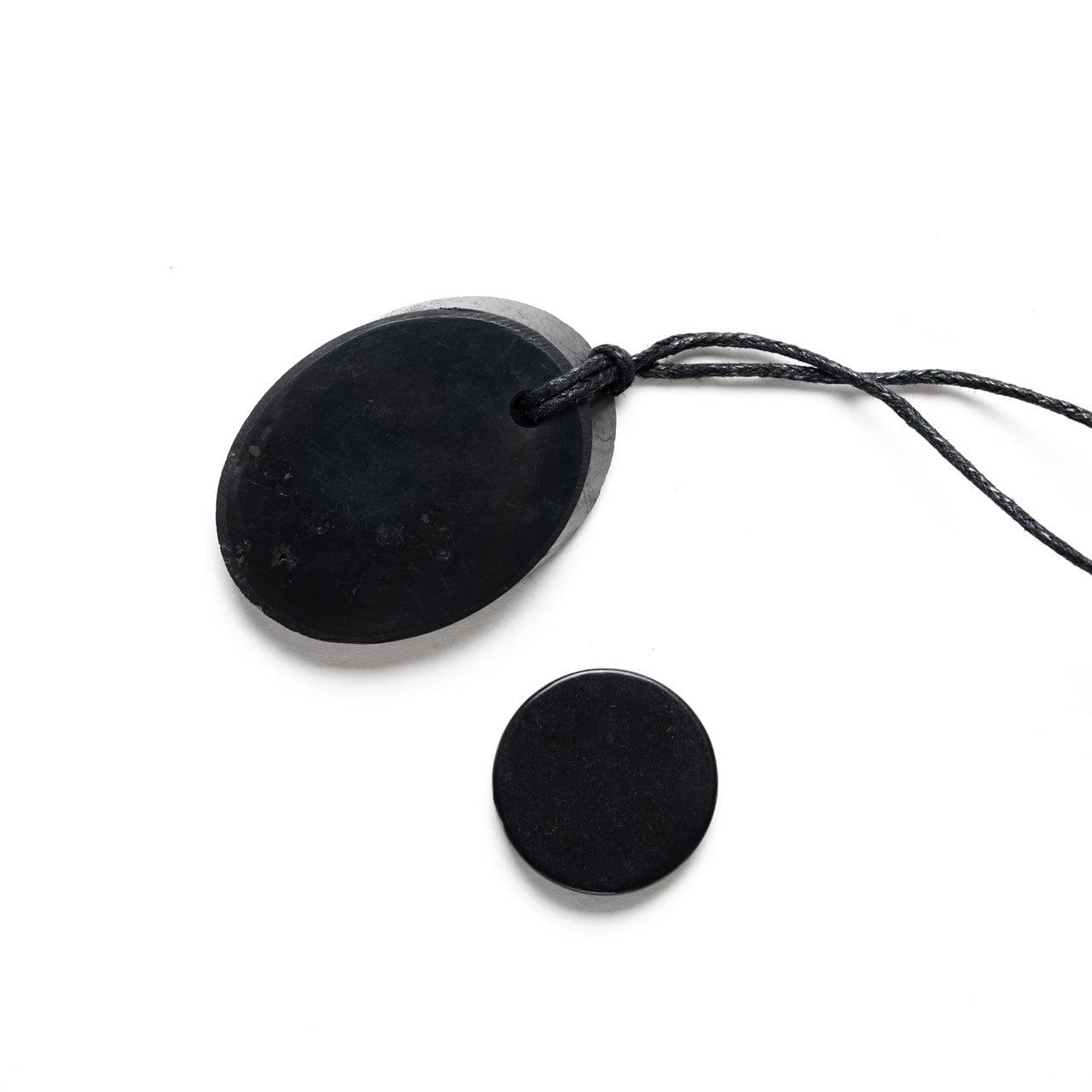 Karelian Heritage shungite phone sticker 0.8-inch round; potential device protection and energy balance.
