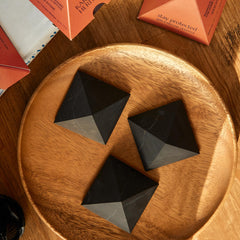 Karelian Heritage shungite pyramid bulk packaging with business card